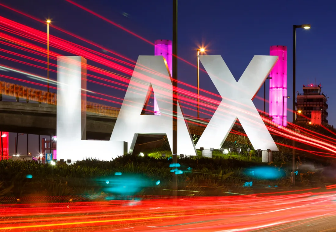 LAX sign at Los Angeles International Airport at night