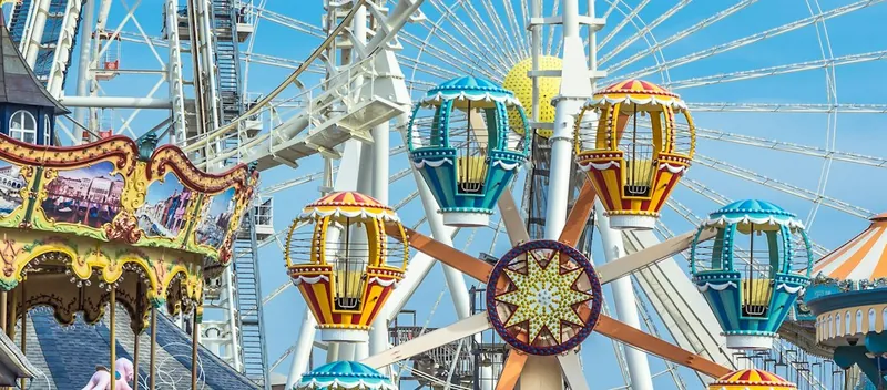 A ferris wheel against a blue sky