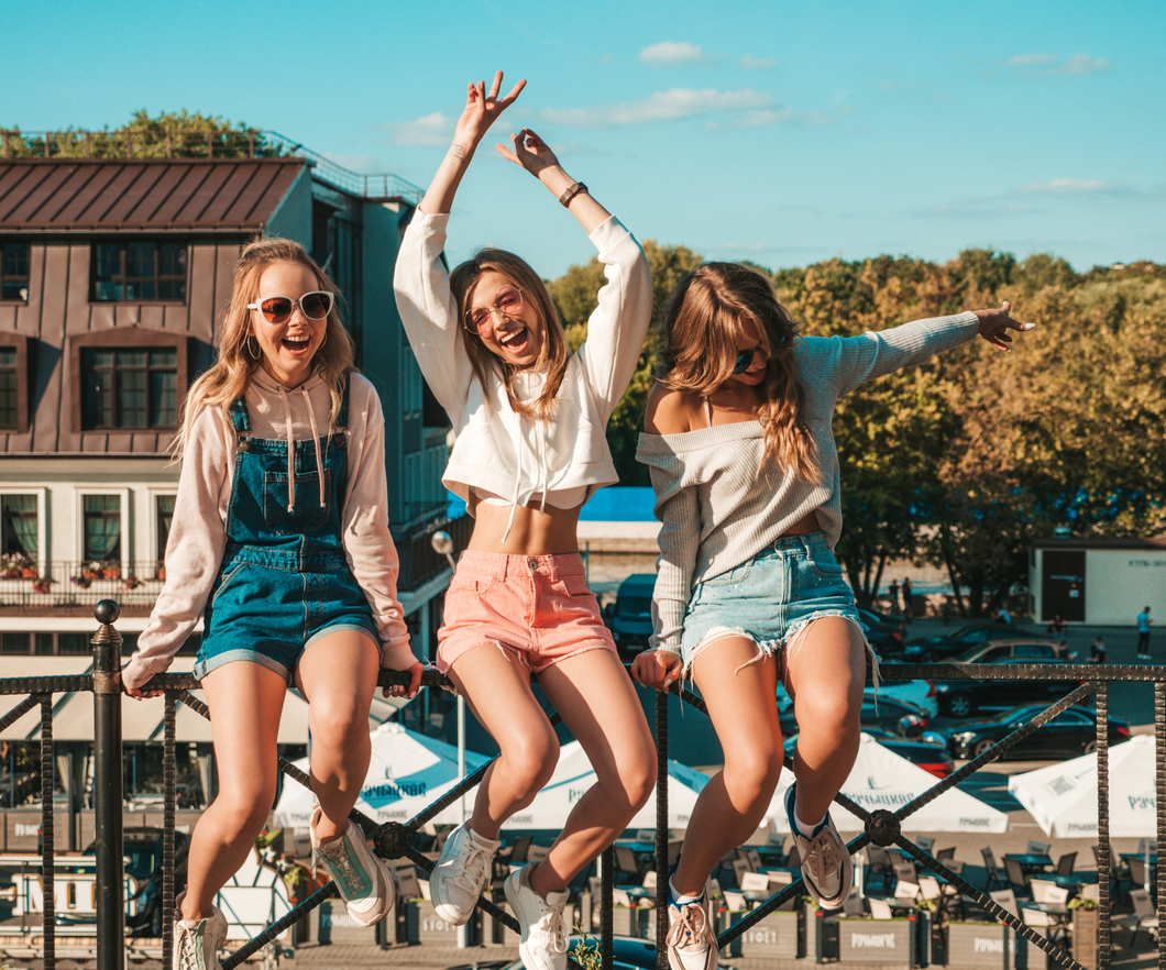 Group of friends riding together on a summer trip