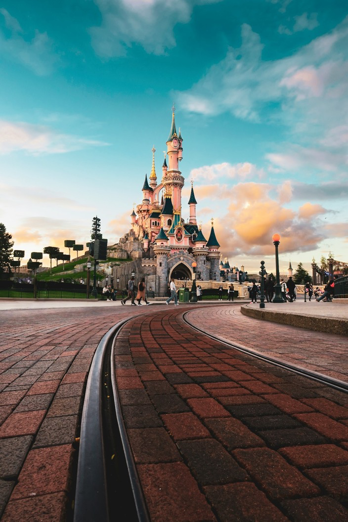 Theme park castle at dusk